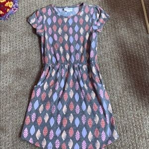 Great Used Condition Mae with leaf design.